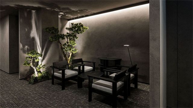 Waiting corner with armchairs and pine bonsai at DayBeau Skin Clinic Myeongdong Premium