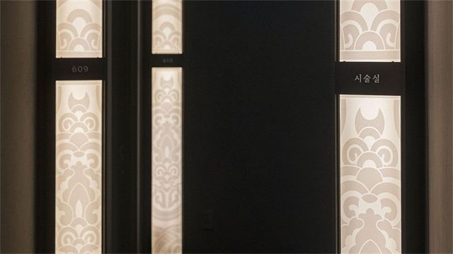 Doors of single-patient treatment rooms (room 609) at DayBeau Skin Clinic Myeongdong Premium