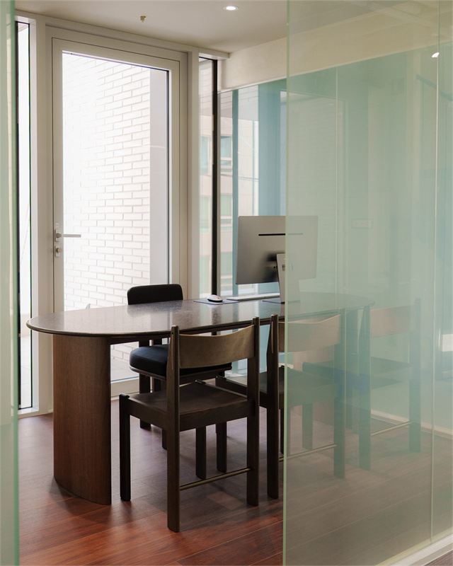 Consultation room with a round table at Sartine Skin Clinic